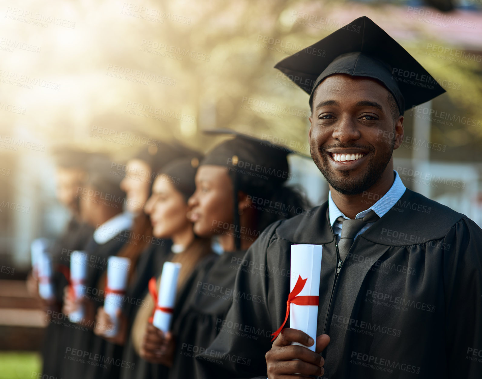 Buy stock photo Portrait, student and smile with diploma for graduation celebration, education achievement and success. Excited, man and certificate scroll, opportunity and learning goals for university ceremony