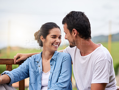 Buy stock photo Cropped shot of an affectionate young couple spending time together outdoors