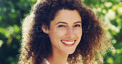 Buy stock photo Portrait of a happy and attractive woman outside 