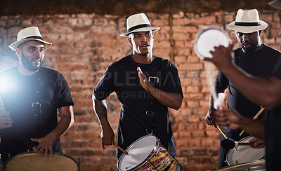Buy stock photo Shot of a group of musical performers playing together