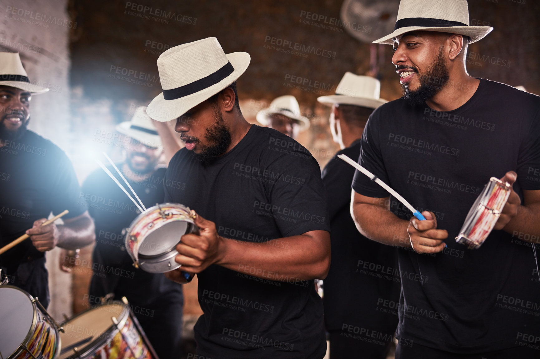 Buy stock photo Shot of a group of musical performers playing together