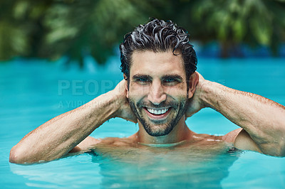 Buy stock photo Man, portrait and happy in swimming pool for travel, relax and tropical holiday at luxury hotel or villa. Male person, face and smile in water for getaway trip, chill and vacation at resort in Greece