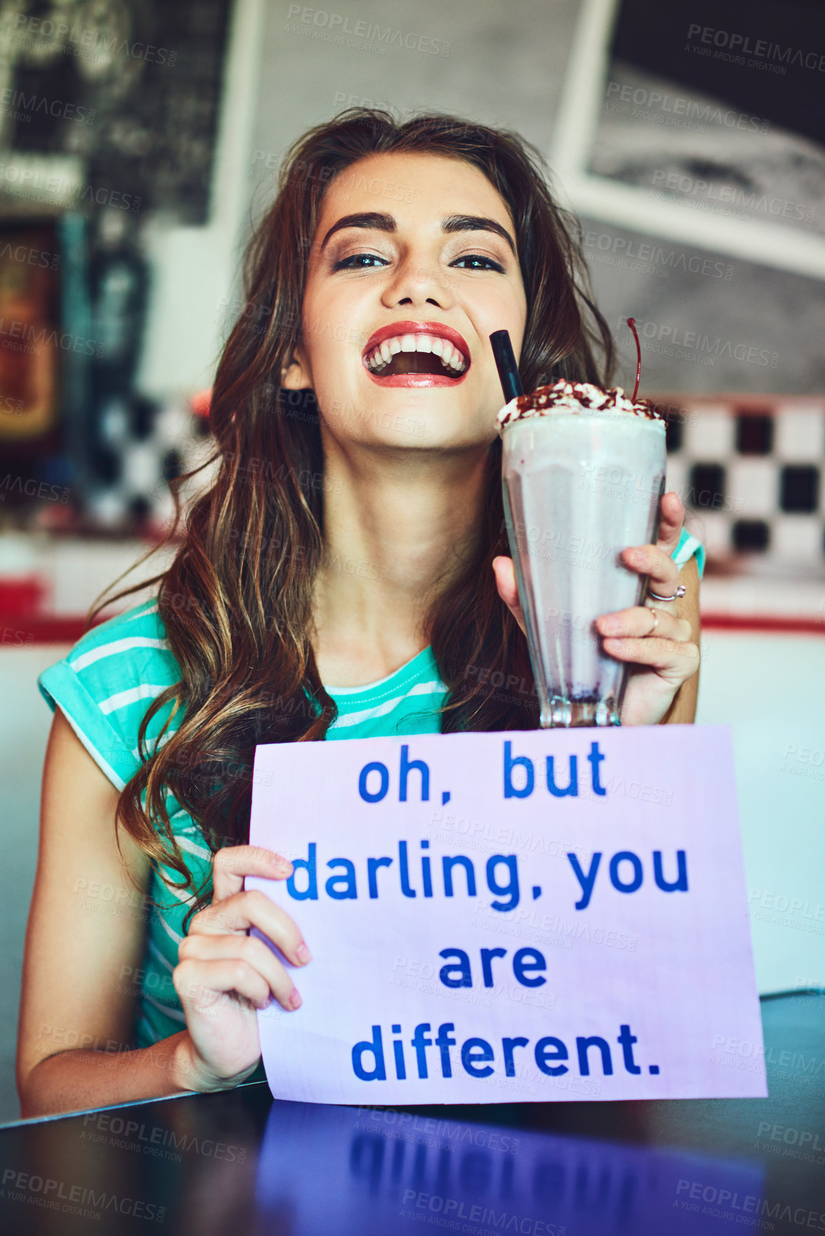 Buy stock photo Poster, portrait and happy woman with milkshake in restaurant for text at retro or vintage diner as customer. Empower, drink or girl with you are different message or sign at American cafe for fun