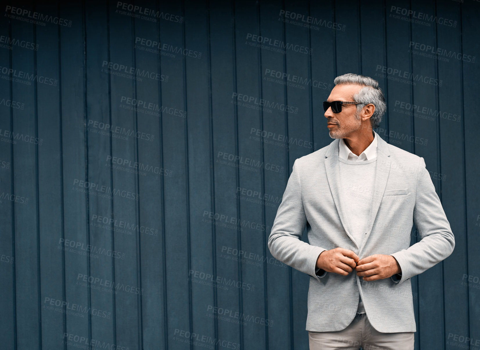 Buy stock photo Businessman, glasses and fashion at wall with space, confidence and thinking with style. Male professional, mature or career in finance, designer suit or corporate job in investing with clothes