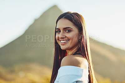 Buy stock photo Cropped shot of a beautiful young woman in nature