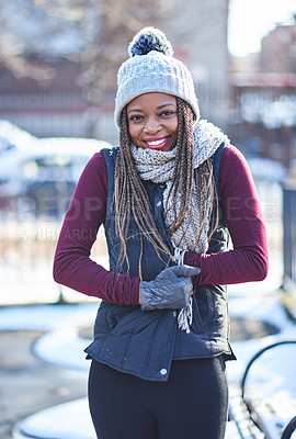 Buy stock photo Portrait of a beautiful young woman enjoying a wintery day outdoors