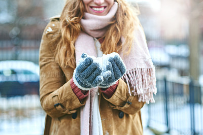 Buy stock photo Shot of an unrecognizable woman enjoying being out in the snow