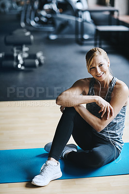 Buy stock photo Music, fitness and woman in gym for training, 
exercise and workout with earphones for audio. Sports, pilates and person on yoga mat for recovery, relax and break for wellness, health and performance