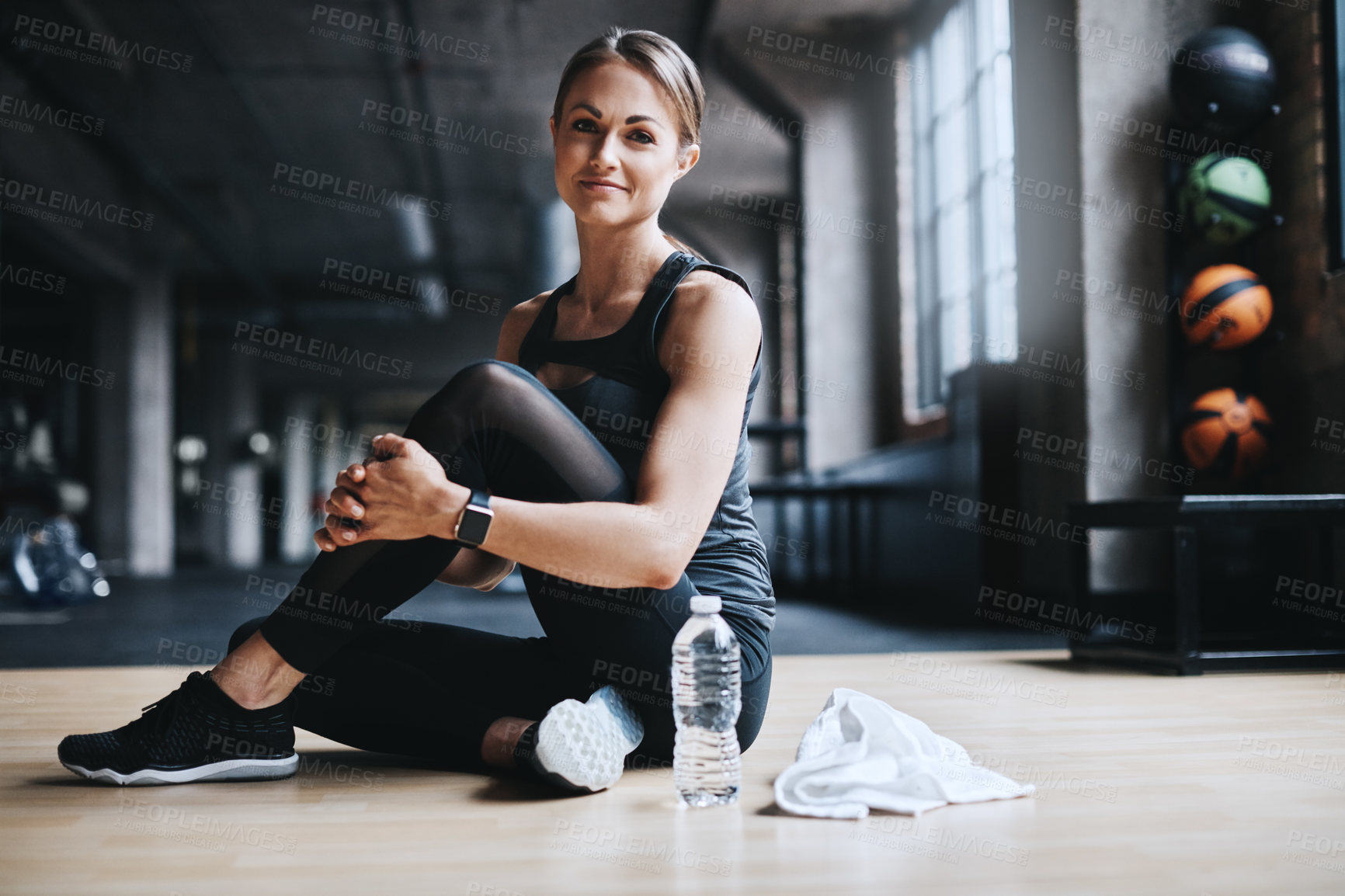 Buy stock photo Full length portrait of an attractive young woman working out in the gym
