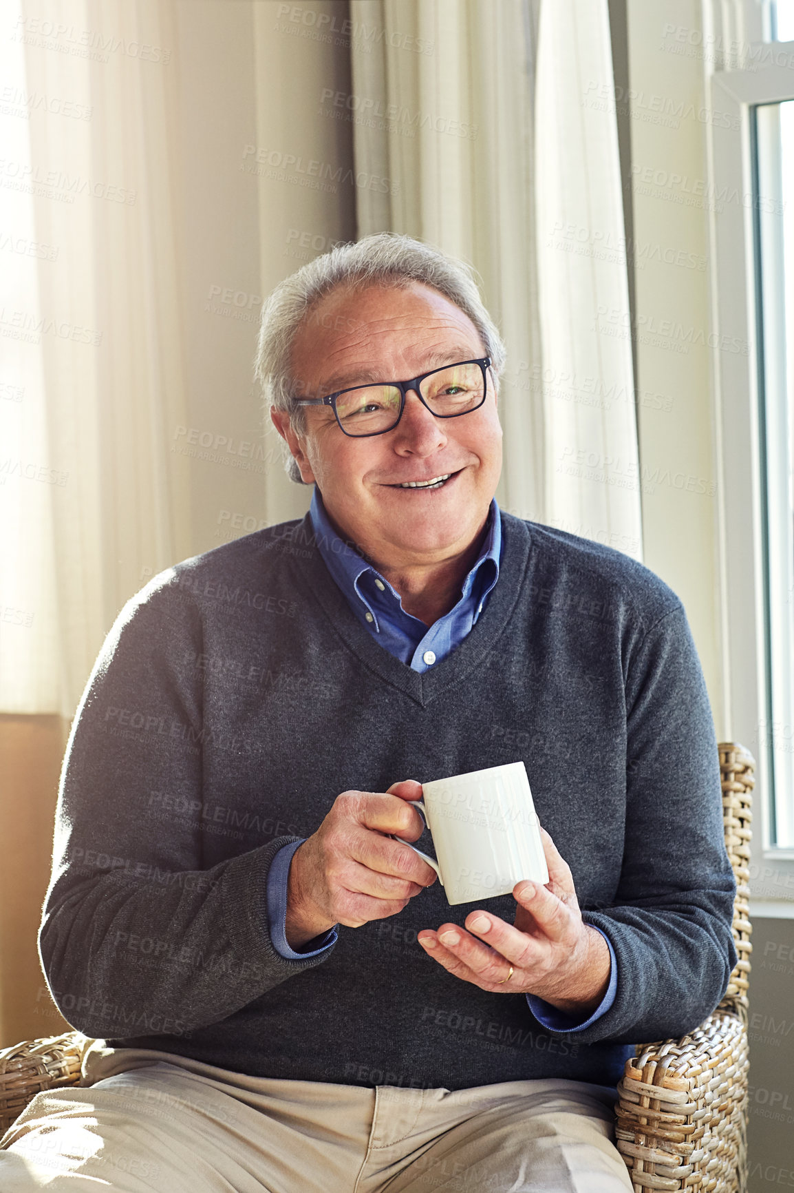 Buy stock photo Cropped shot of a senior man relaxing at home