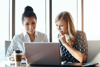 Buy stock photo Brainstorming, women and laptop in office for business, planning and company project at desk. Technology, collaboration and together in workplace for support, teamwork and female people in New York