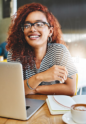 Buy stock photo Shot of an attractive young woman working in a cafe