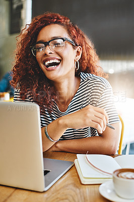 Buy stock photo Shot of an attractive young woman working in a cafe