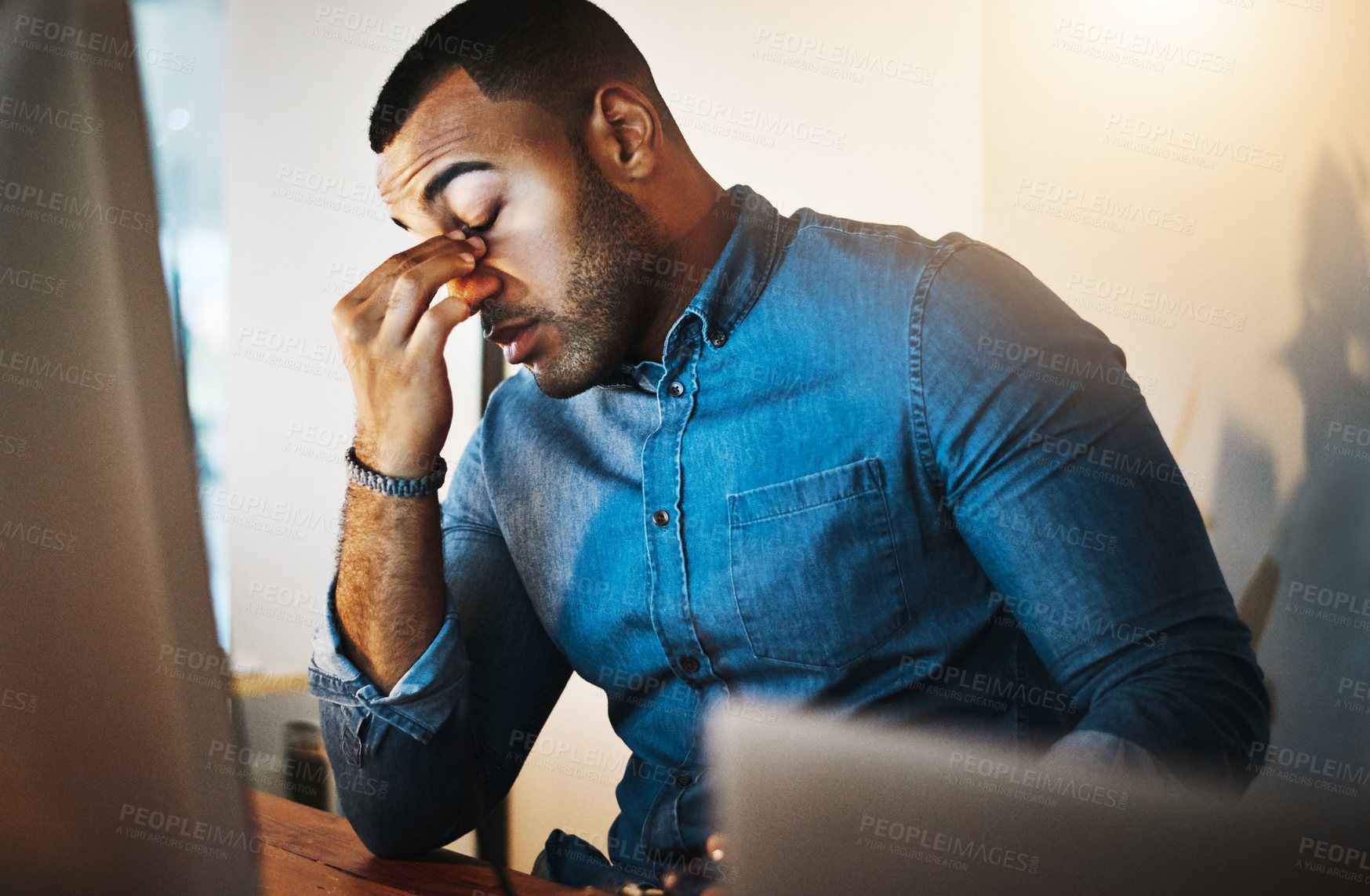 Buy stock photo Migraine, burnout and businessman working in office at night with computer for corporate research. Stress, headache and professional African employee working overtime on deadline project in workplace