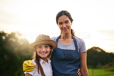 Buy stock photo Farming, smile and woman with daughter, portrait and outdoor in countryside, sustainable or agriculture. Nature, farmer and people with quality assurance of soil, crops and production of plants