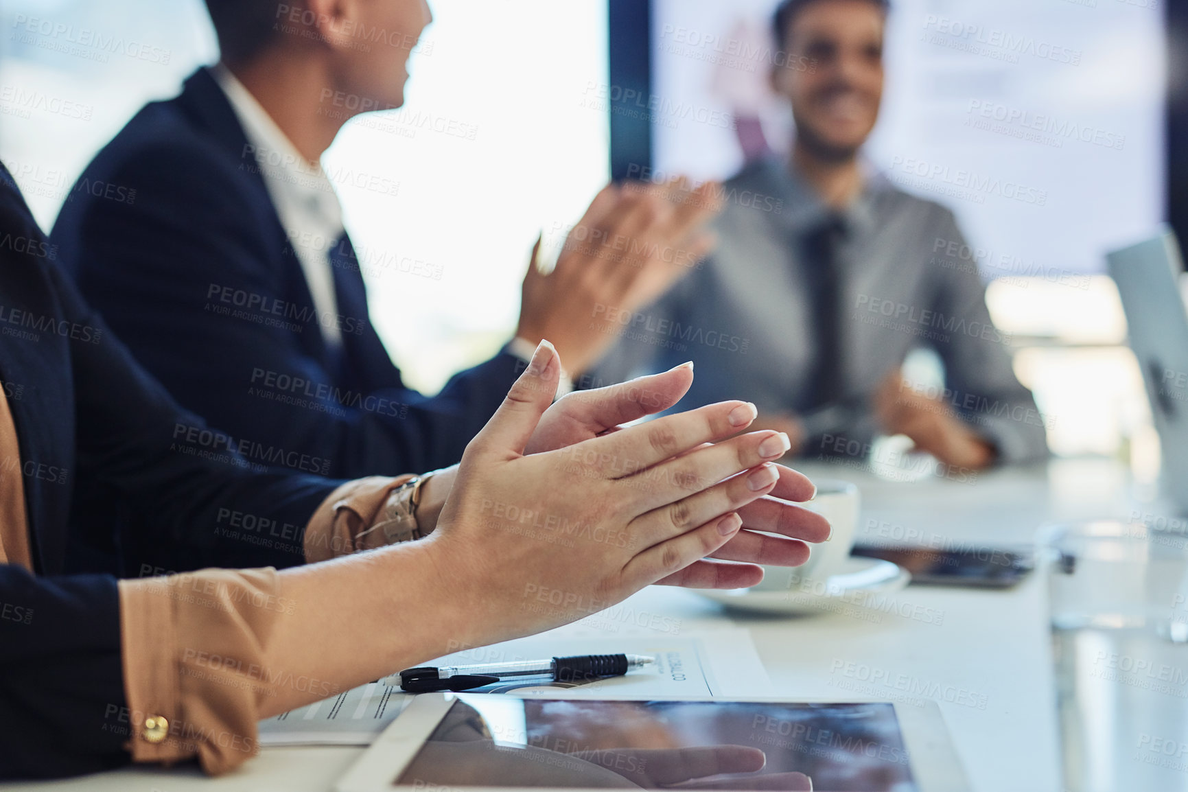 Buy stock photo Cropped shot of a group of businesspeople clapping during a meeting in a modern office