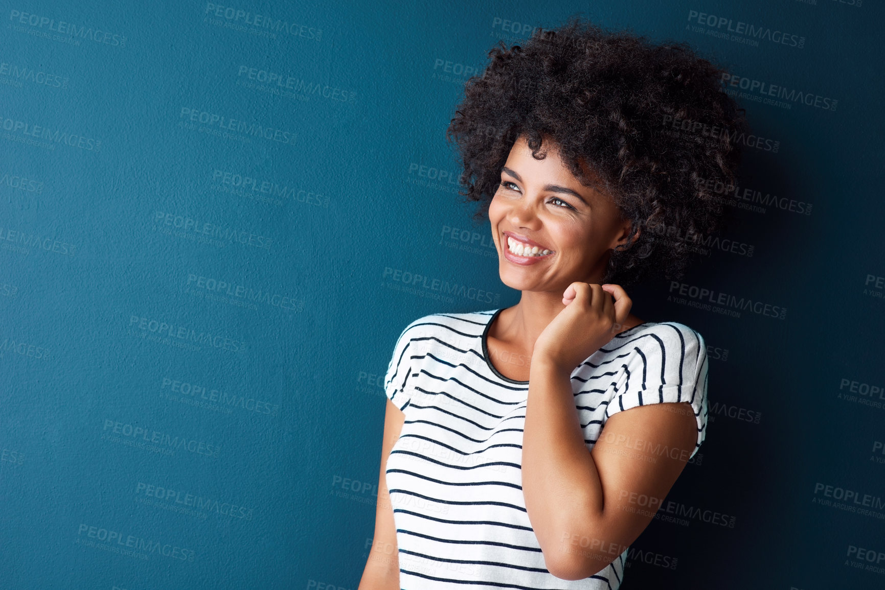 Buy stock photo African woman, studio and happiness for fashion, stripes on shirt or style for mockup. Female student, blue background and hand with clothes for university, smile for education New York City