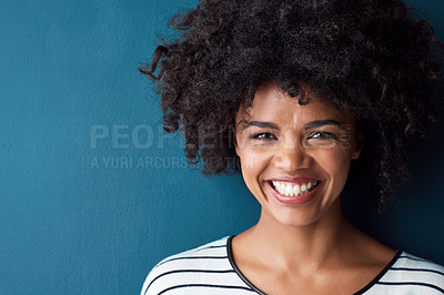 Buy stock photo Black woman, portrait and smile with funny, glow and confident on blue studio background. Girl, face and model with afro laughing for comic, funny and happiness or positive with natural beauty 