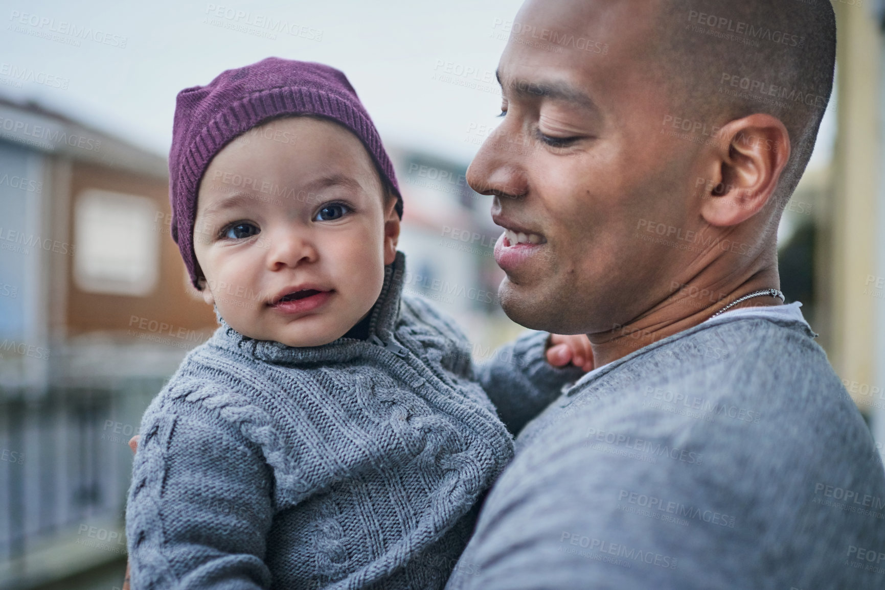 Buy stock photo Shot of a father bonding with his little son outdoors