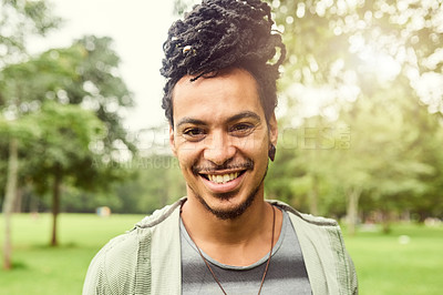 Buy stock photo Man, portrait and park with young person happy about nature, travel and freedom. Freelance musician, smile and  student busker in New York, countryside and garden relaxing for summer fun and health