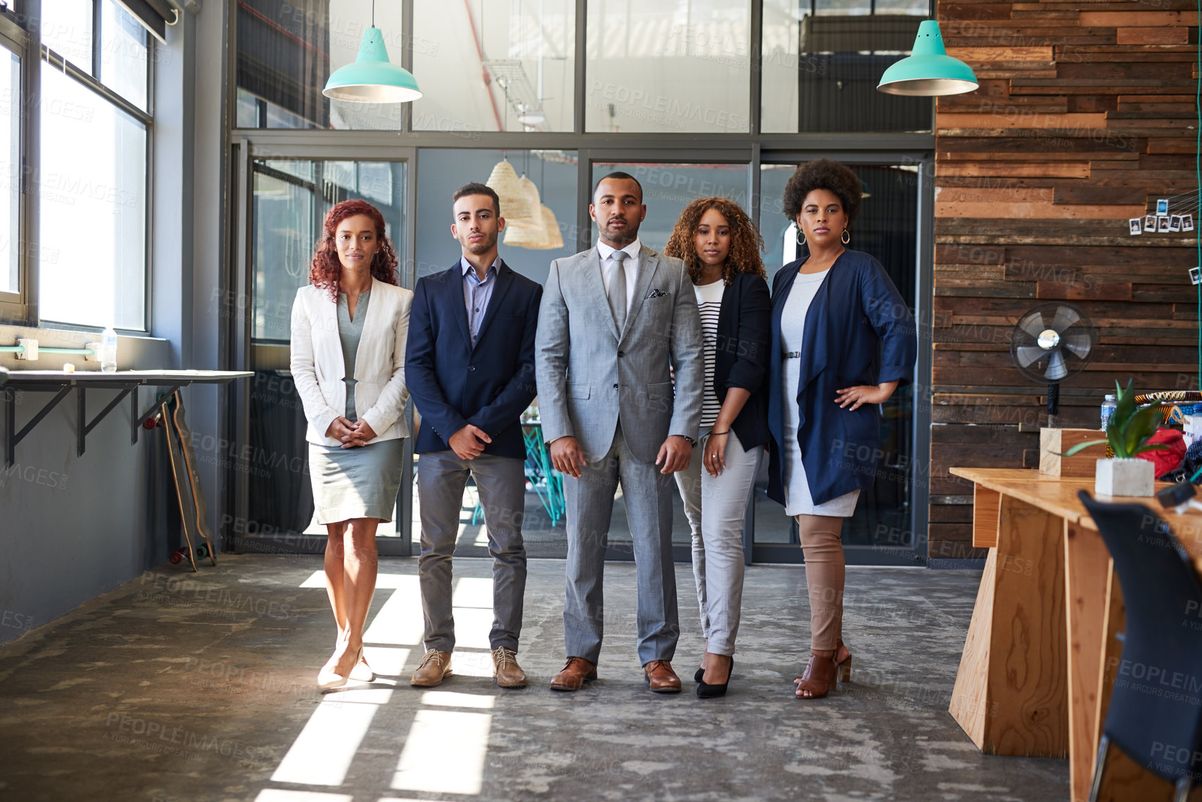 Buy stock photo Portrait of a group of businesspeople standing together in an office