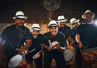 Buy stock photo Portrait of a group of musical performers playing drums together