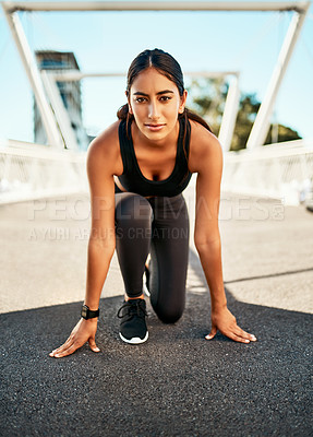 Buy stock photo Start, position and portrait of woman with exercise in city for outdoor, training and beginning of run. Serious, athlete and person on floor in summer for fitness, marathon and preparing for workout