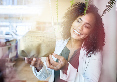 Buy stock photo Shot of a beautiful young woman on a shopping spree