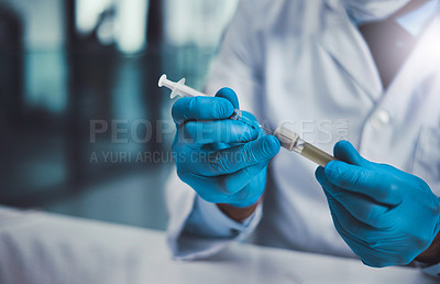 Buy stock photo Cropped shot of an unrecognizable scientist working in a lab