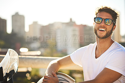 Buy stock photo Biker, travel and portrait with man in city for motorcycle, freedom and transportation. Journey, summer vacation and speed with person driving on motorbike for vintage driver, adventure and explore