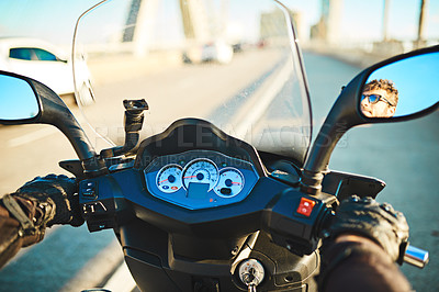 Buy stock photo Cropped shot of an unrecognizable man riding a motorbike