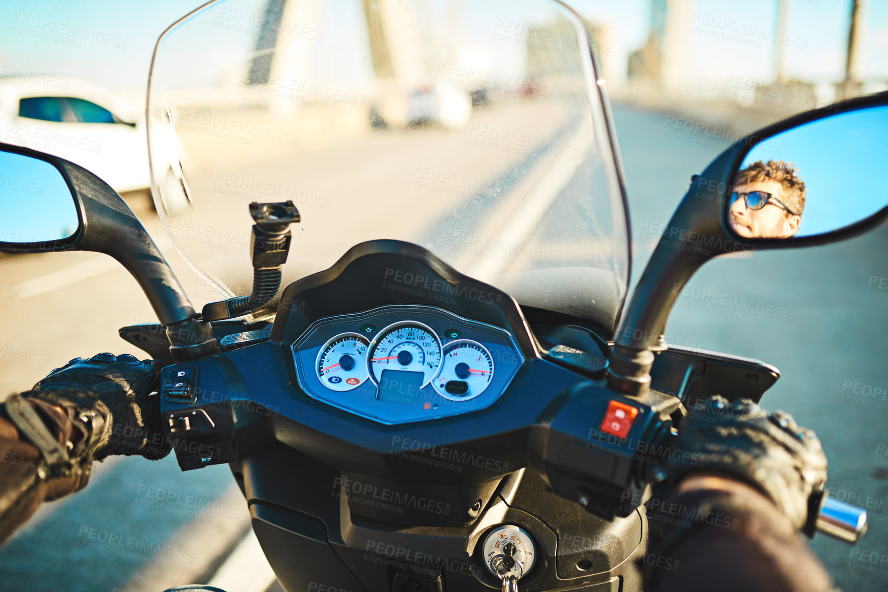 Buy stock photo Cropped shot of an unrecognizable man riding a motorbike