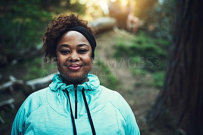 Buy stock photo Portrait of a sporty young woman ready to workout in the forest