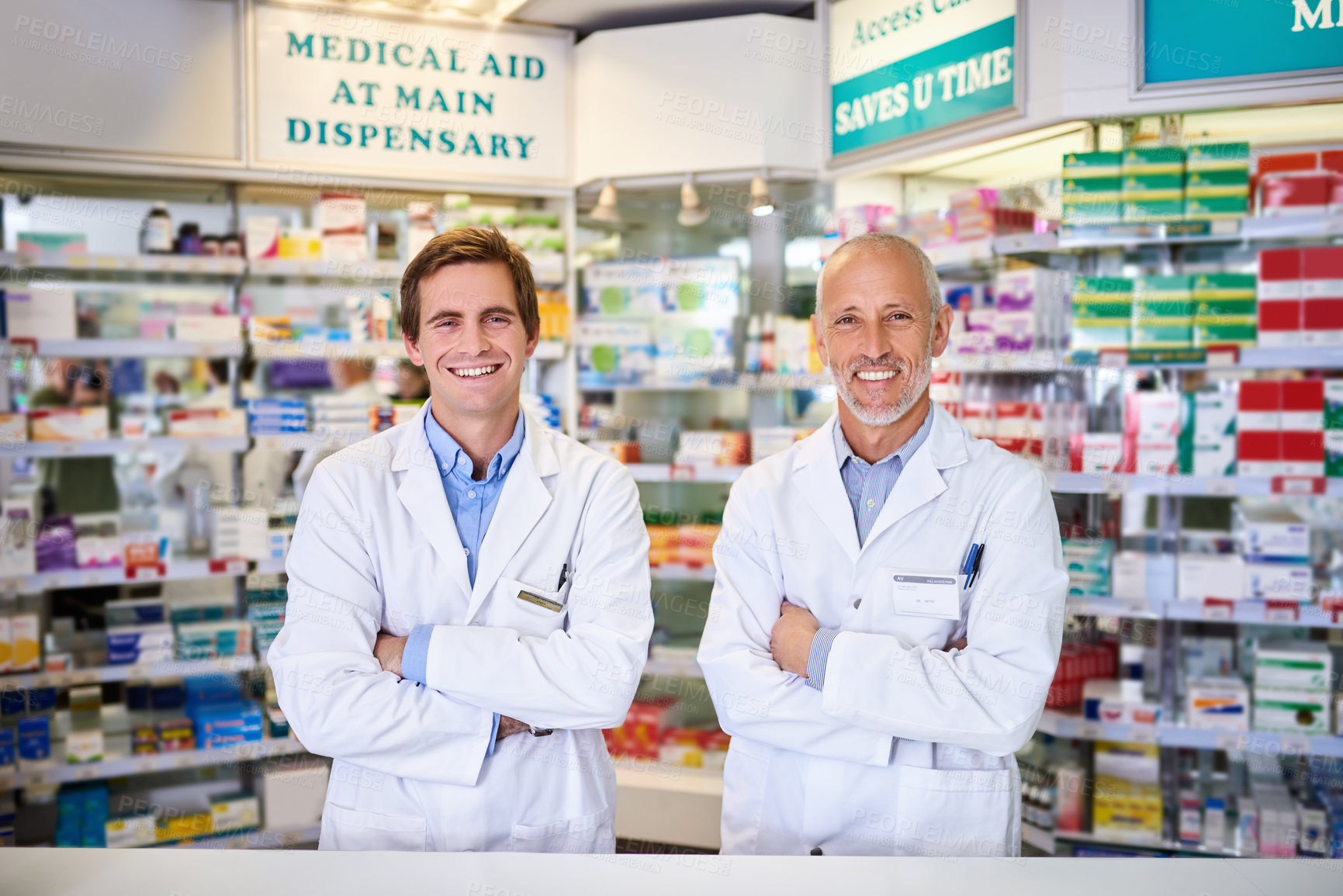 Buy stock photo Portrait of two male pharmacists working in a chemist