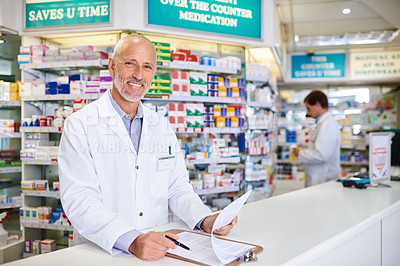 Buy stock photo Pharmacist, dispensary and portrait of man with clipboard for inventory, prescription and info at counter. Medical, mature professional and smile with checklist for healthcare, order and pills record