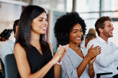 Buy stock photo Cropped shot of a group of young businesspeople applauding during a seminar in the conference room