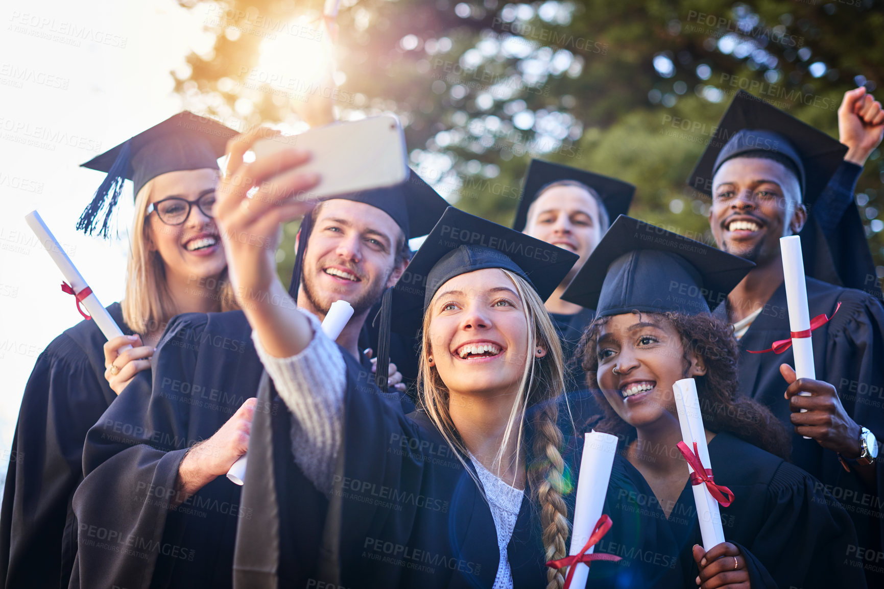 Buy stock photo University students, graduation and smile for selfie with certificate on campus for social media or memories. People, college and classmate or friends with happiness for education and qualification