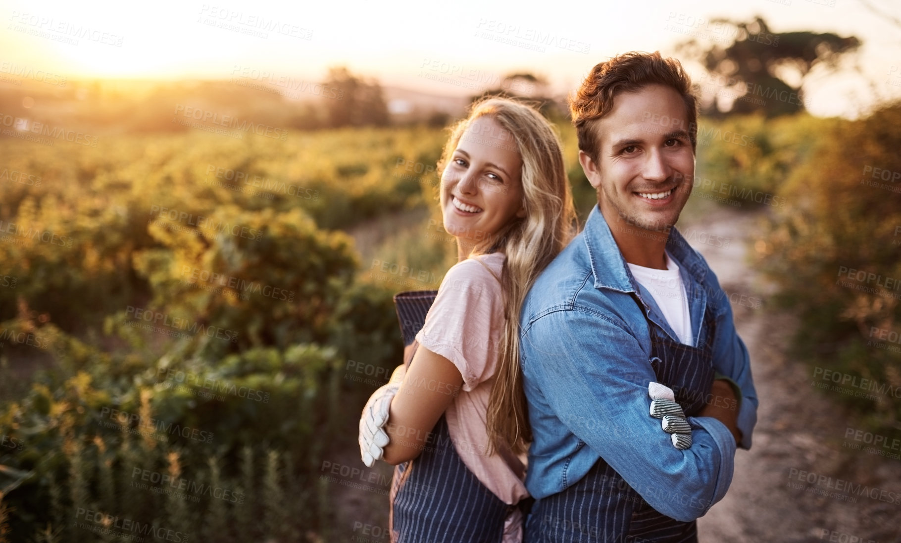 Buy stock photo Portrait of a confident young man and woman working together on a farm