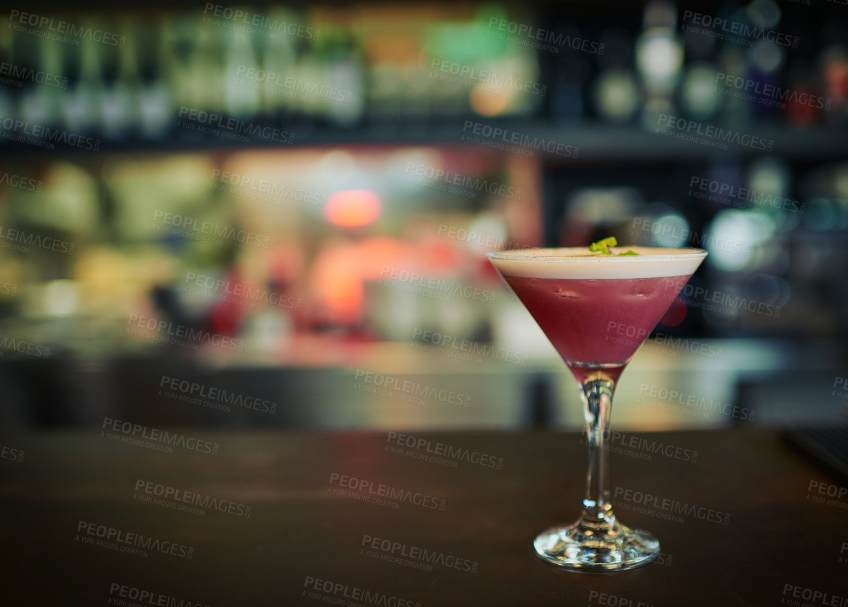 Buy stock photo Fruit cocktail, glass and alcohol drink on counter at pub, night club and bar for restaurant service. Nightclub mockup, party and closeup of pink beverage on wooden table for person with copy space