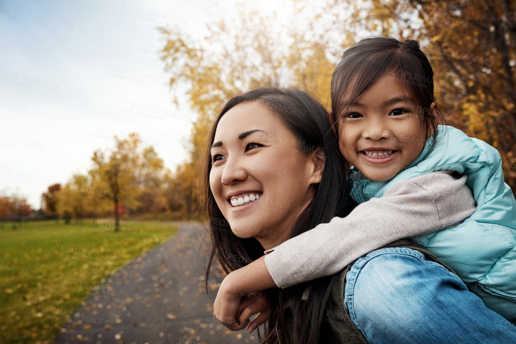 Buy stock photo Shot of a mother bonding with her little daughter outdoors