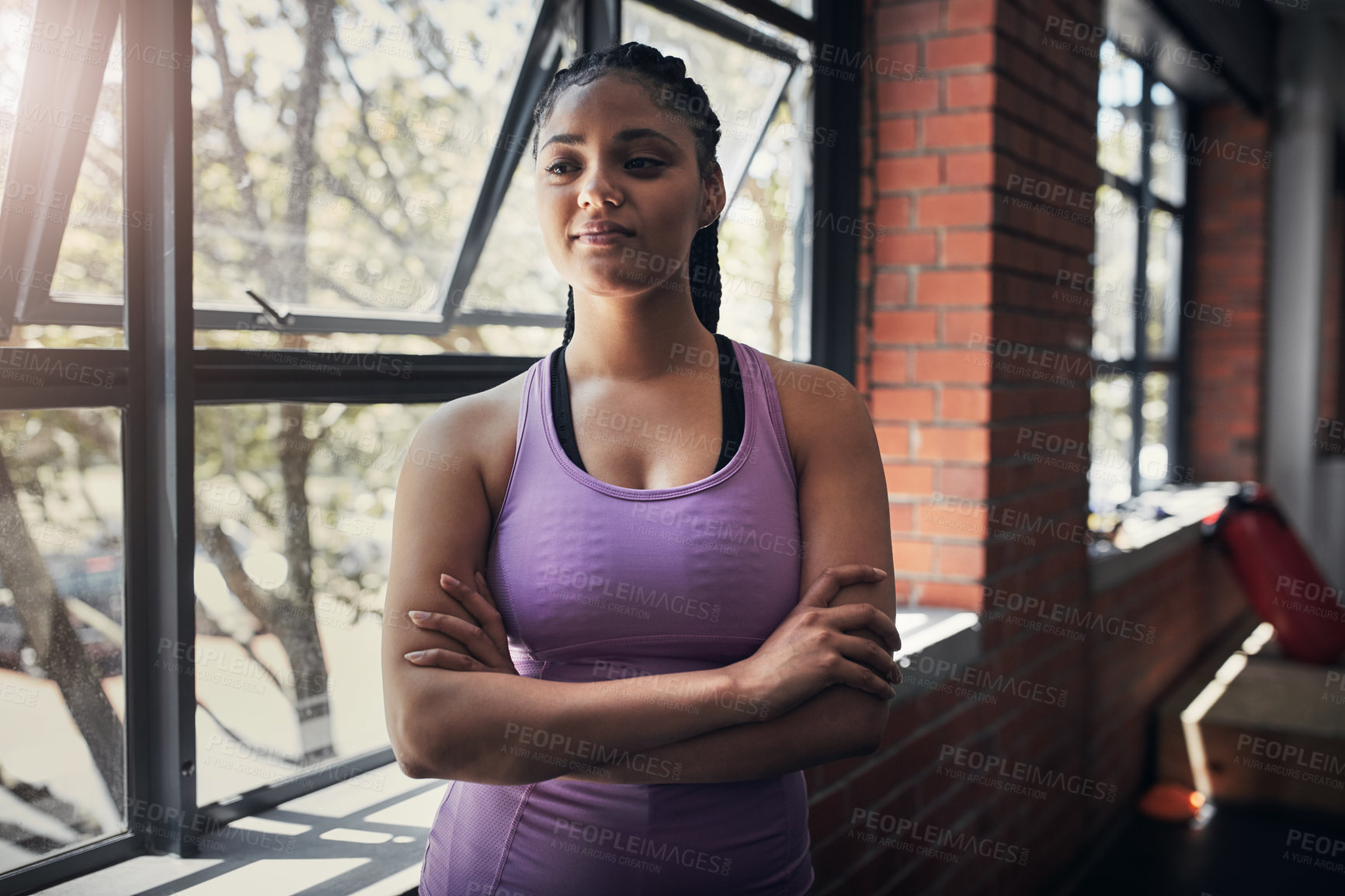 Buy stock photo Shot of a beautiful young woman at the gym