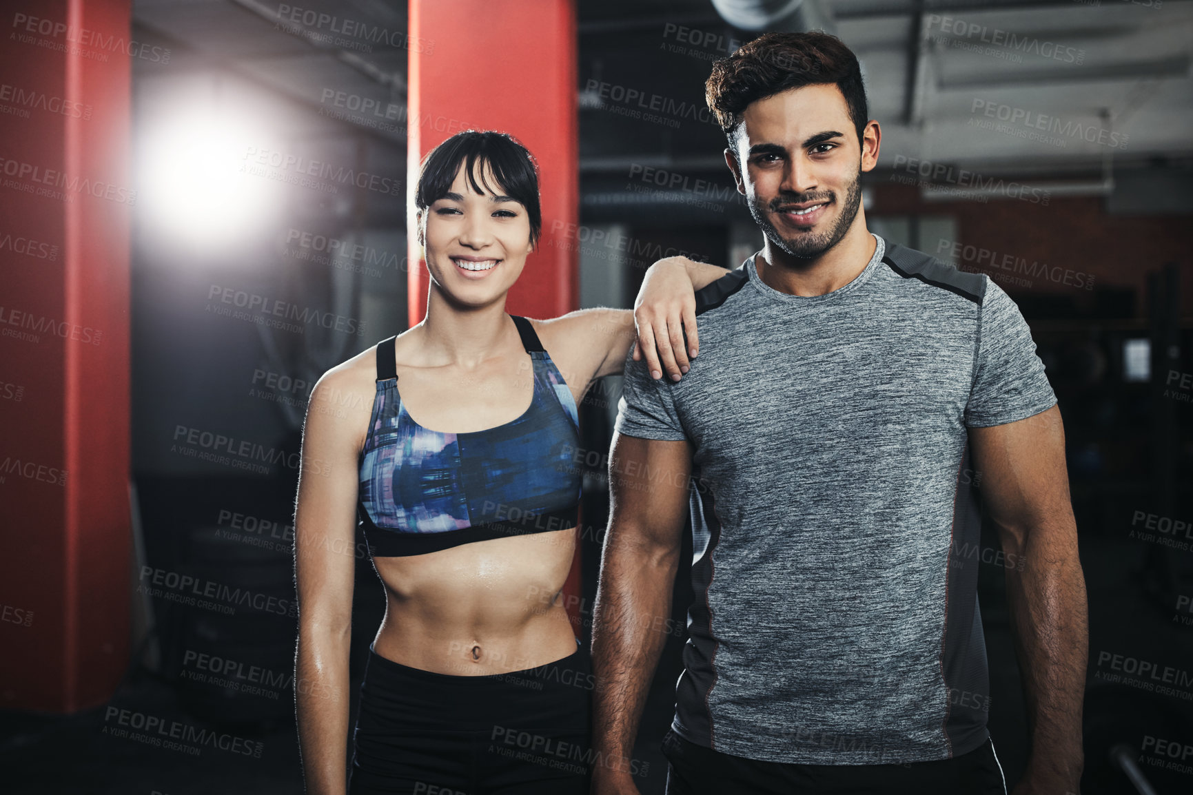 Buy stock photo Portrait of two young people at the gym for a workout