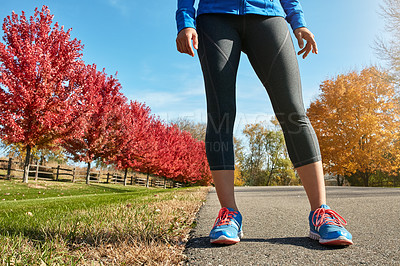 Buy stock photo Closeup shot of an unrecognizable woman exercising outdoors