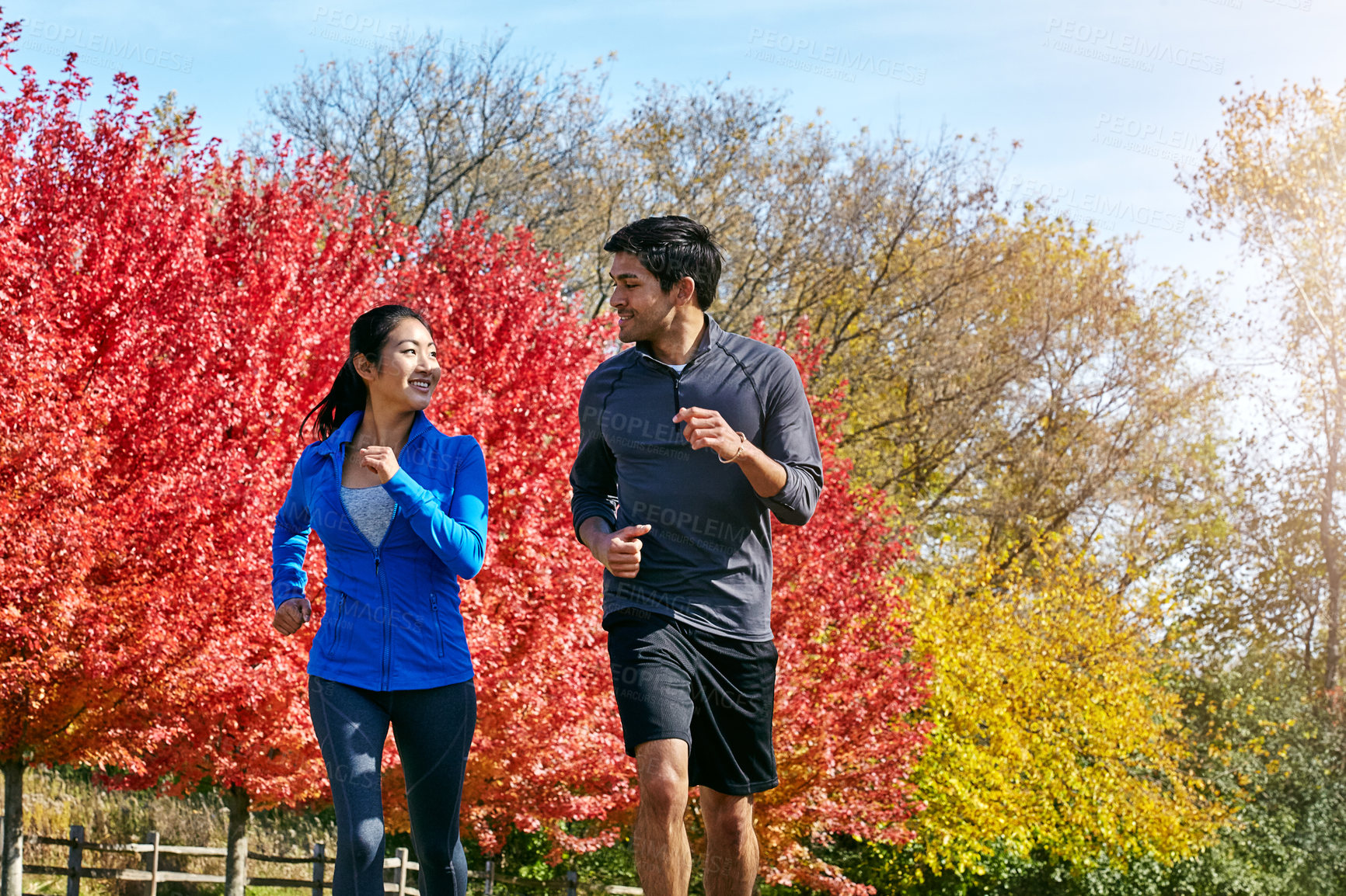 Buy stock photo Couple, running and fitness with exercise, nature and cardio with break, wellness and bonding together. Healthy people, outdoor and man with woman, runner or speed with energy, challenge or endurance