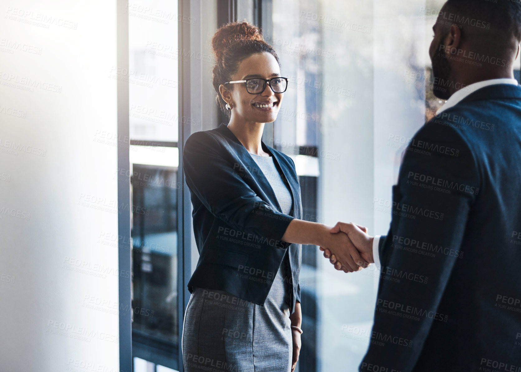 Buy stock photo Hand shake, man and woman in hallway for welcome, b2b collaboration and business meeting with respect. Businessman, partnership and shaking hands for human resources, hiring and smile in workplace