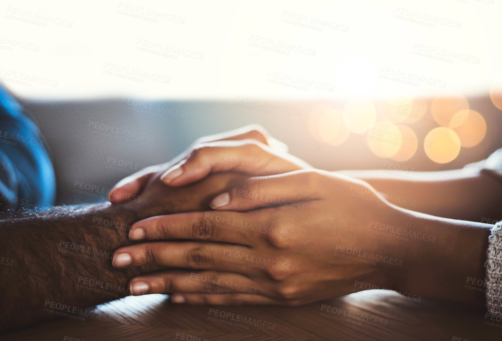 Buy stock photo Empathy, love and support with people holding hands for safety, security or trust in home closeup. Depression, mental health or praying and friends in pain from grief or loss with compassion and hope