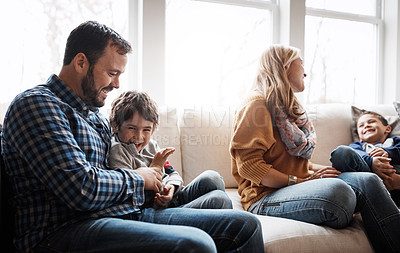 Buy stock photo Portrait of two adorable little boys having fun with their parents at home