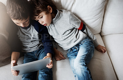 Buy stock photo Top view, children or tablet for movie streaming, social media, or esports gaming on family home sofa. Curious kids, brothers or boys on digital technology for education app, learning support or help