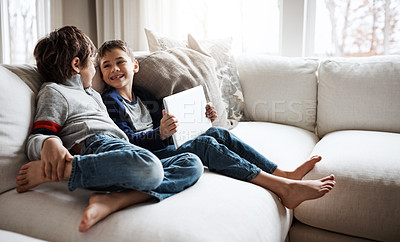 Buy stock photo Relax, family and child siblings with tablet on home sofa for bonding, wellness and streaming smile together. Lounge couch and young kids with app device for online movie entertainment.
