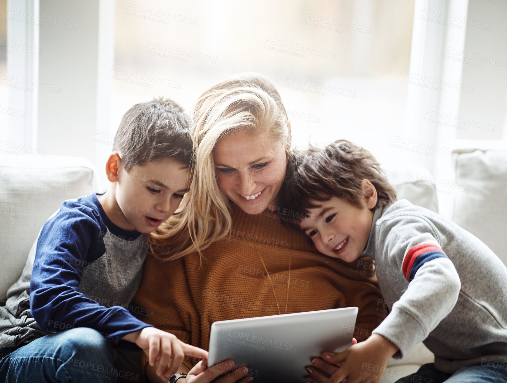 Buy stock photo Love, tablet and mother with children on sofa bonding, quality time and relax on weekend together. Happy, family home and mom and kids with digital tech for online games, learning and internet app